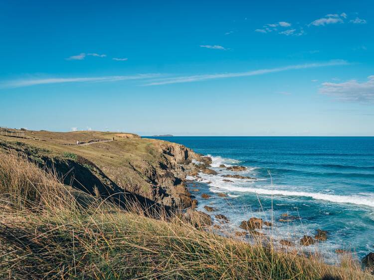 Go for a dip at Emerald Beach
