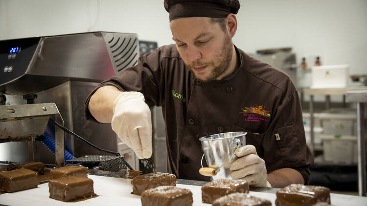 A chef making brownies.