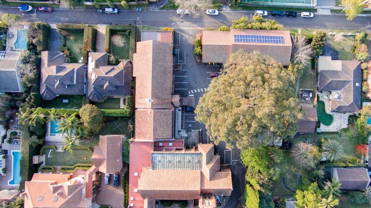 Aerial view of cards, road and garden