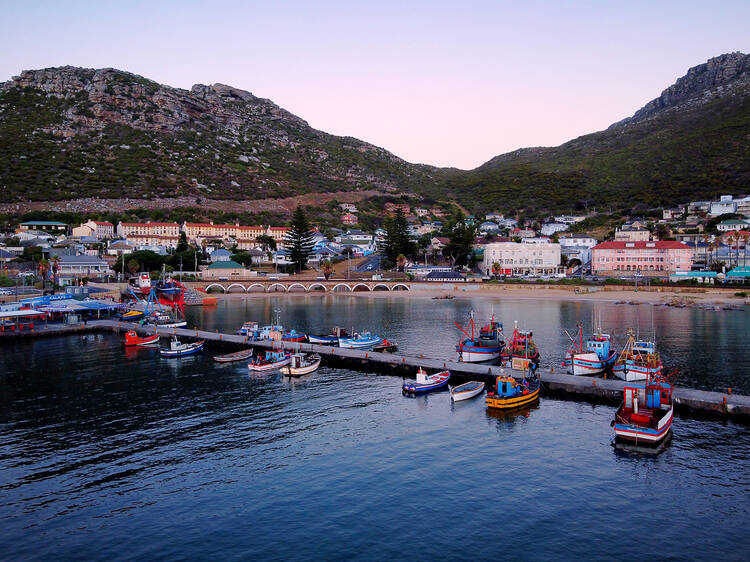Aerial view of Kalk Bay fishing harbor at dawn