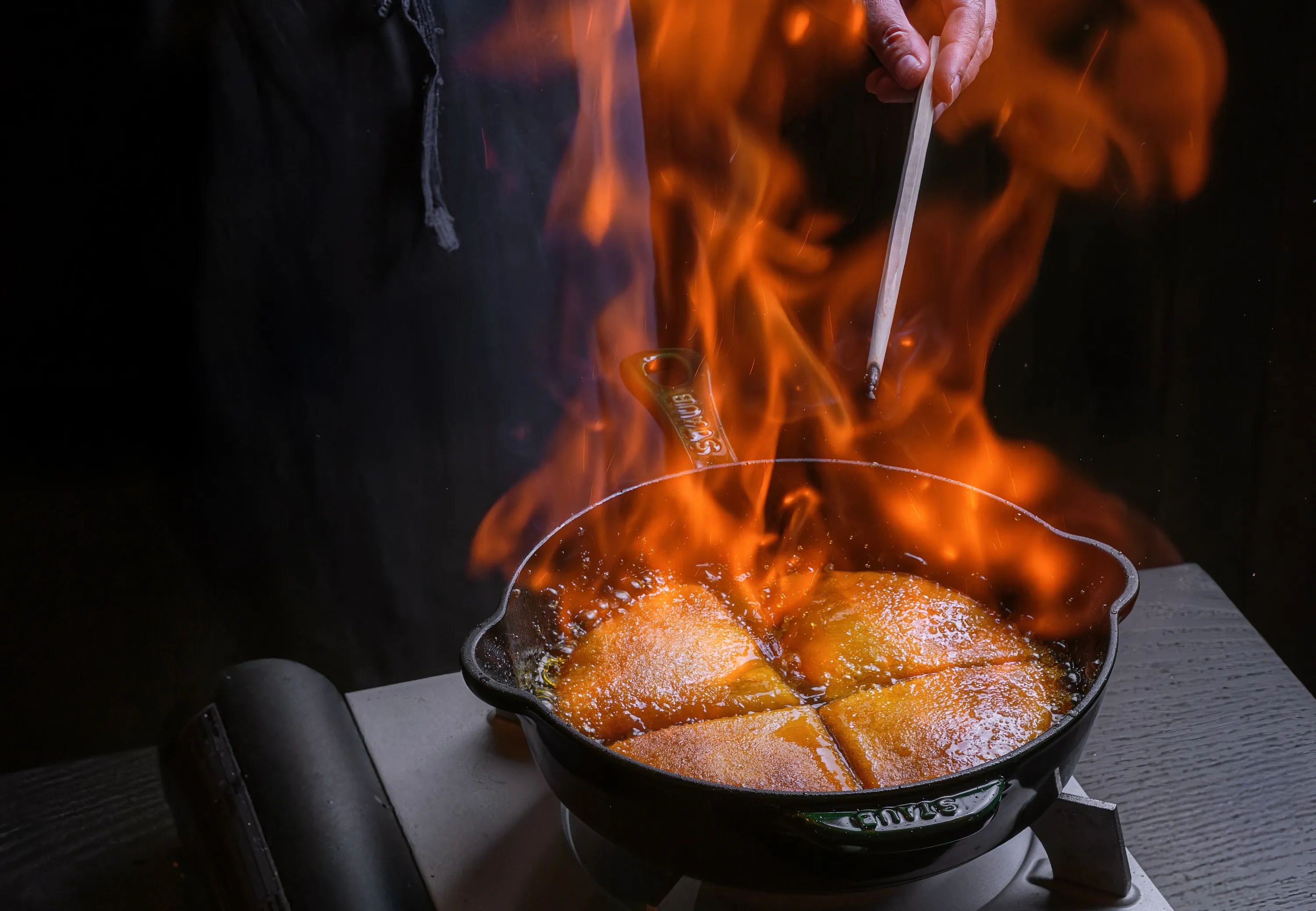 | A flaming cast iron of crepes