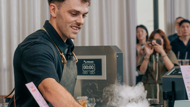 Jack Simpson making a signature coffee drink at the 2025 Australian Barista Championship.