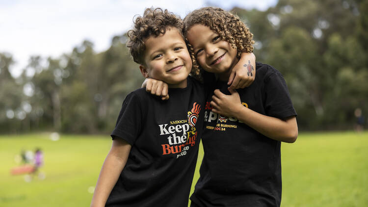 Two kids smiling at Burramatta NAIDOC 