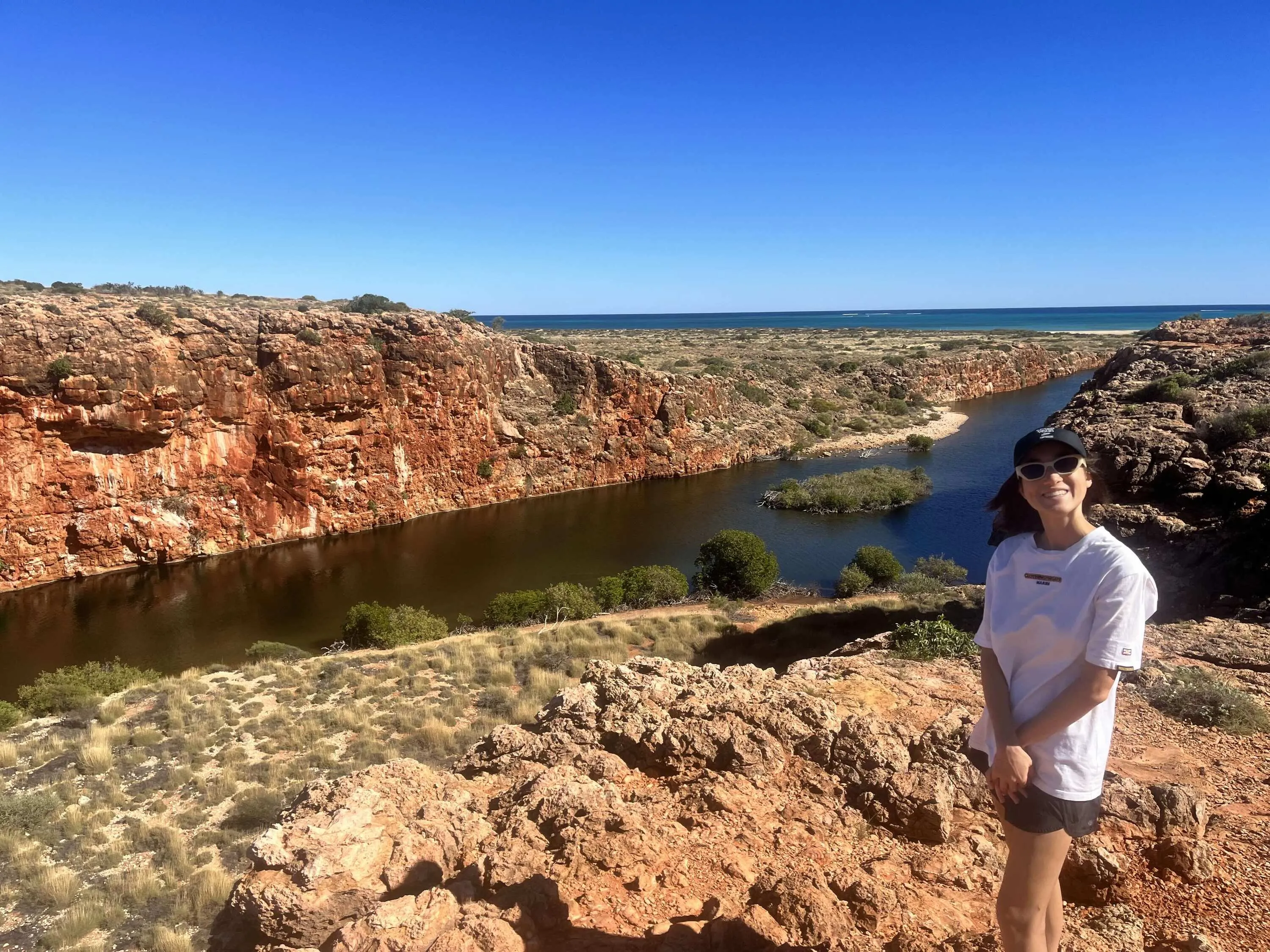 Girl smiling at gorge lookout