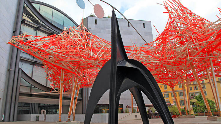 Wooden and metal art installation and facade of Museum of Modern and Contemporary Art (MAMAC), major cultural and touristic landmark in Nice, France.