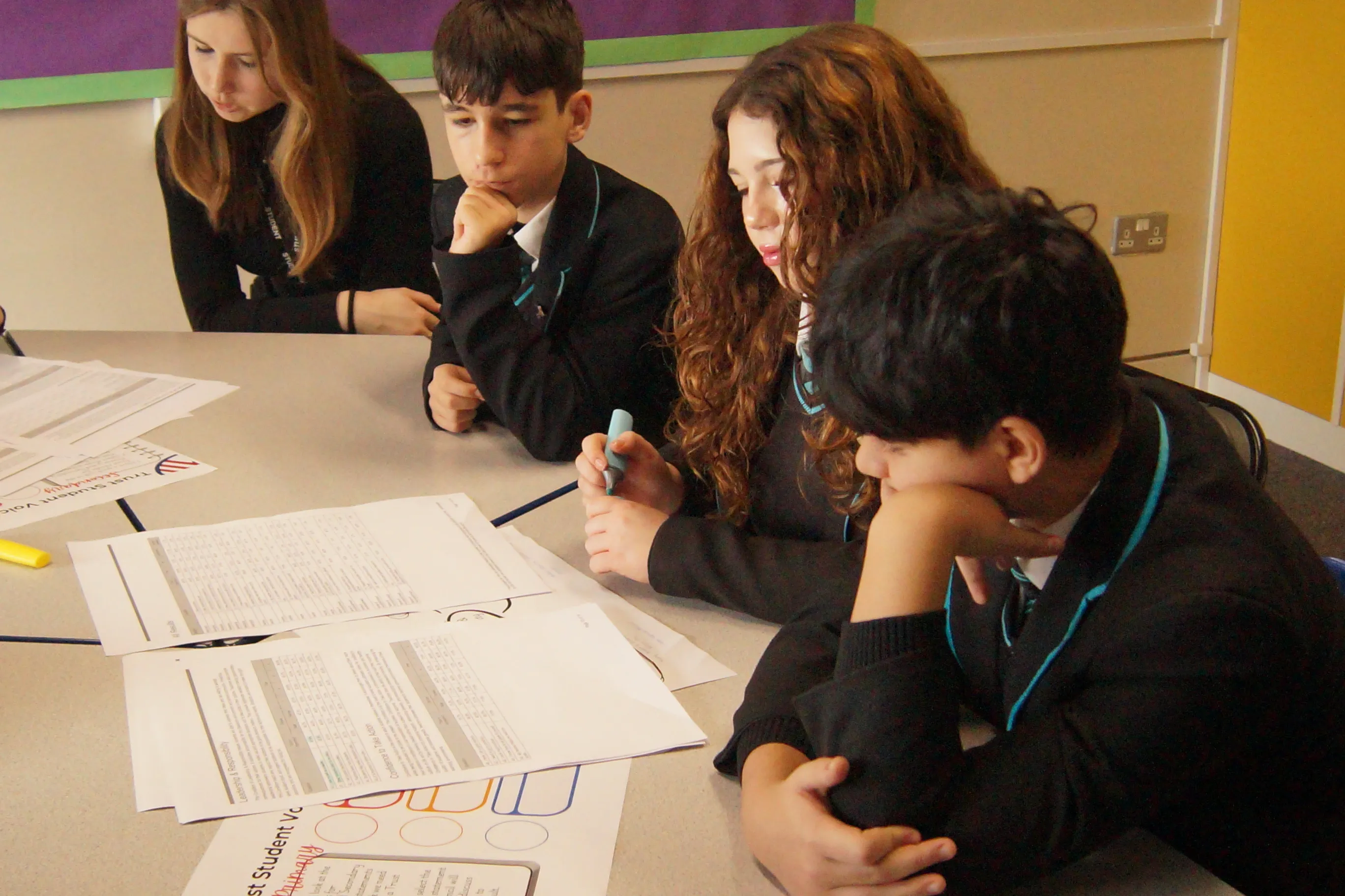 Students working in a group at Rivers Academy West London