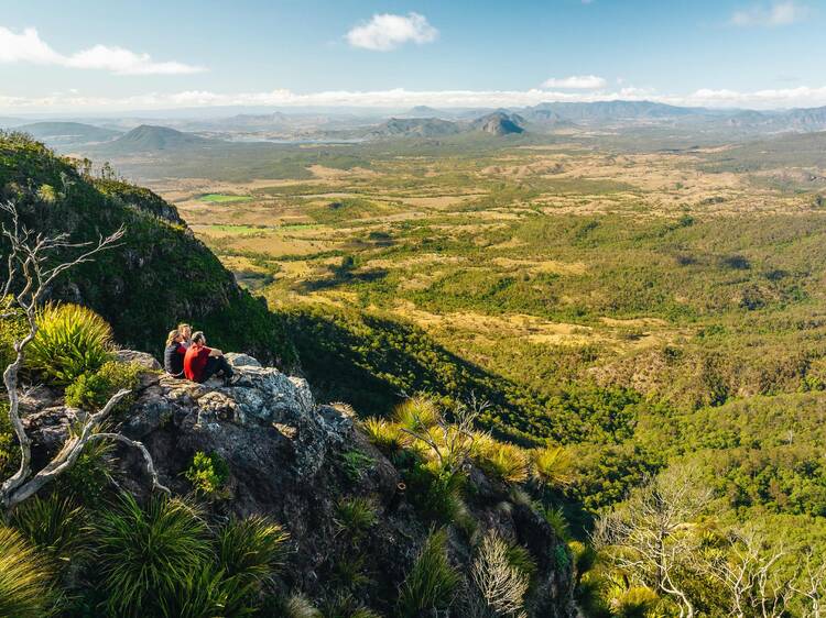 Hikers overlooking mountain range