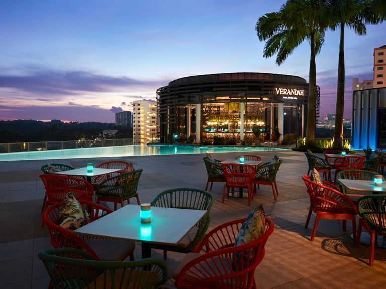 This scenic pool bar in Singapore has a happy hour promotion with $9 cocktails and bar bites