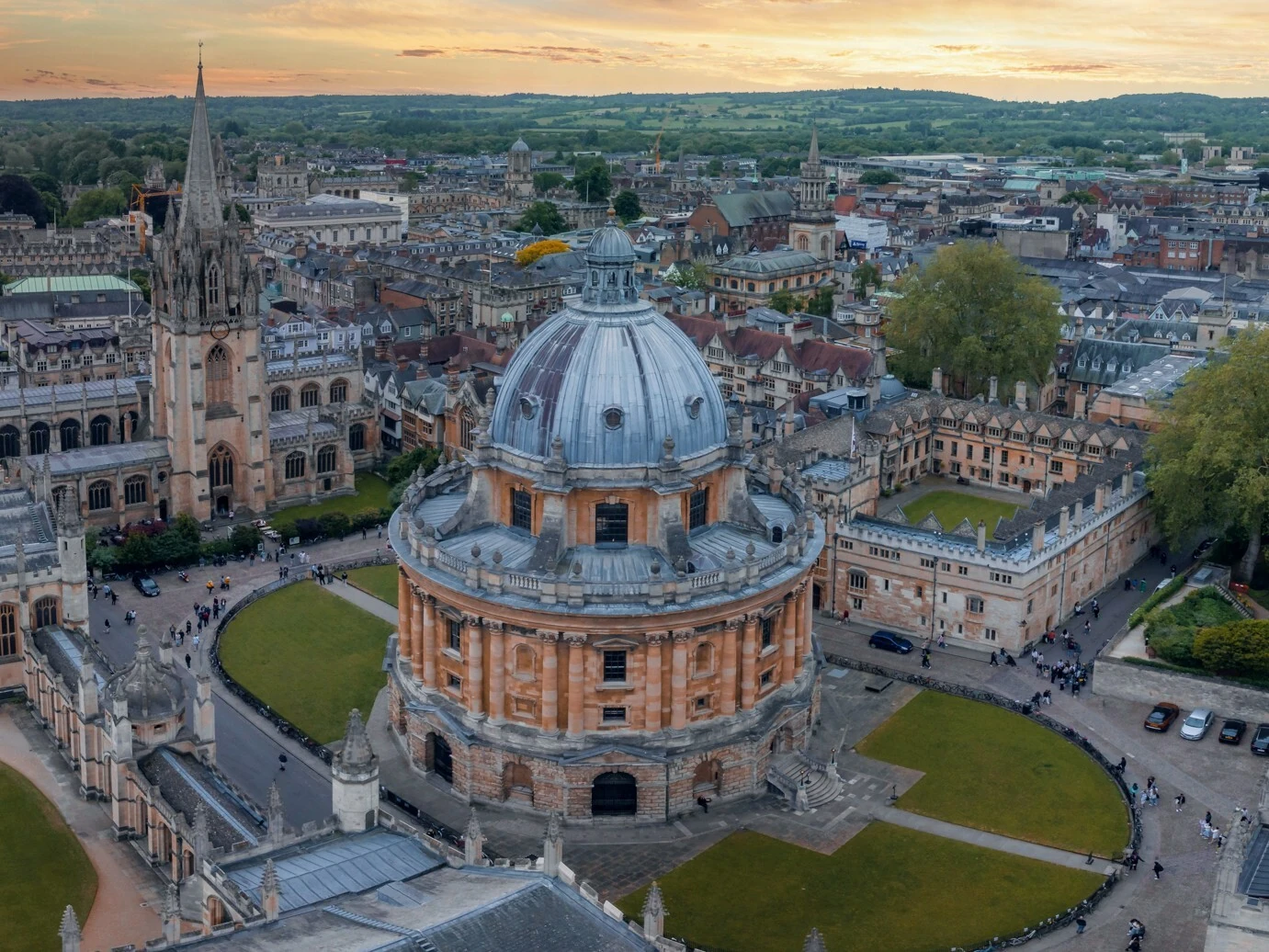 Aerial view of Oxford city centre showing the Bodleian Library in the foreground at sunset