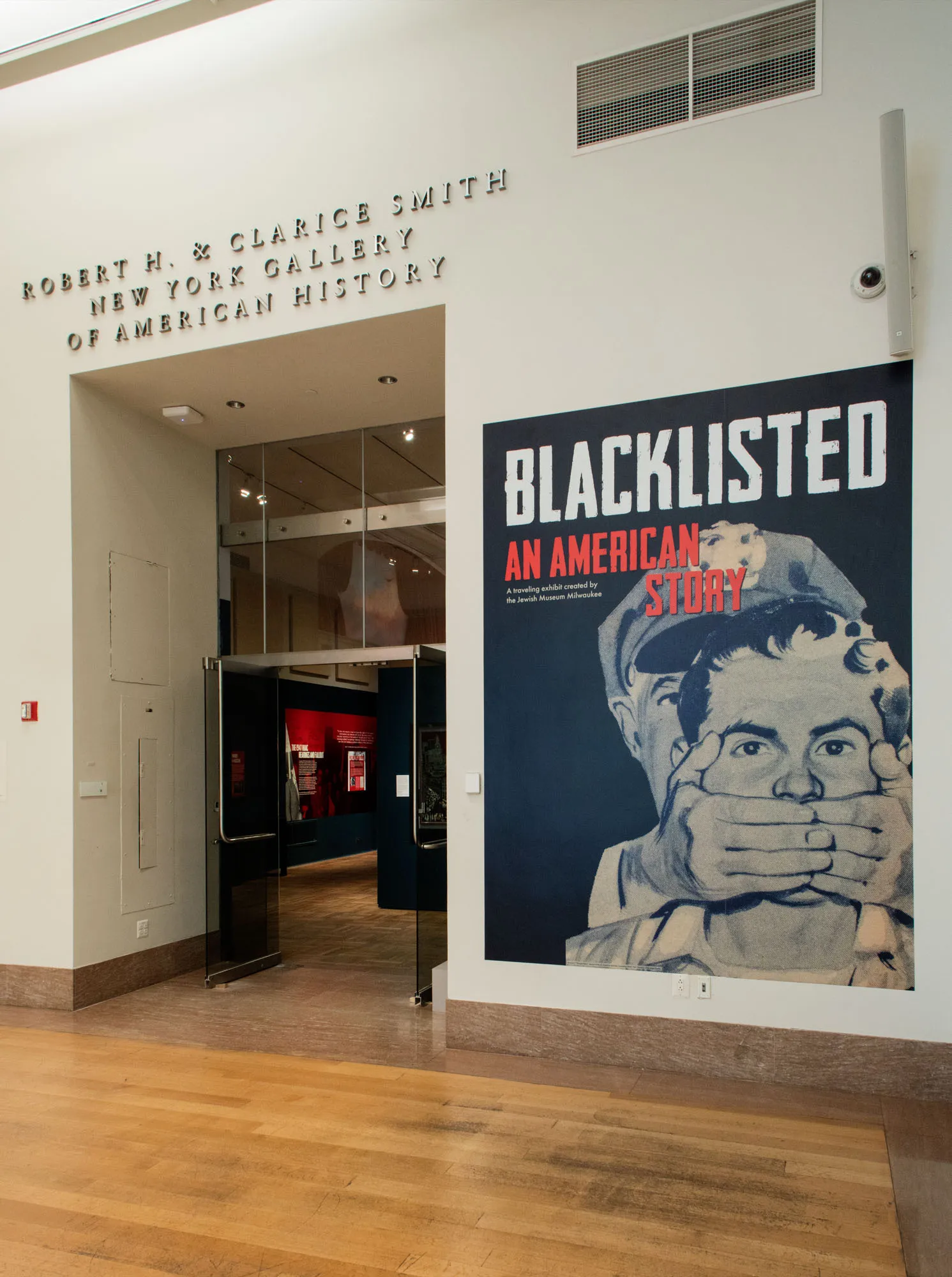 A sign at the exhibit entrance reading "Blacklisted."