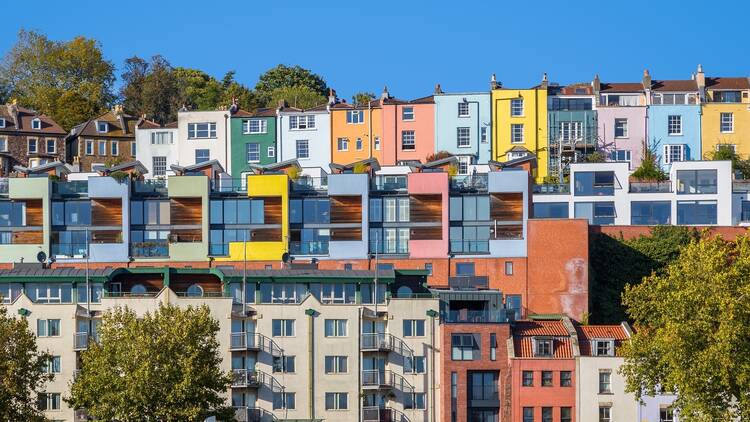 Bristol cityscape, rows of colourful terraced houses in Cliftonwood, Bristol, England , overlooking Bristol Harbourside