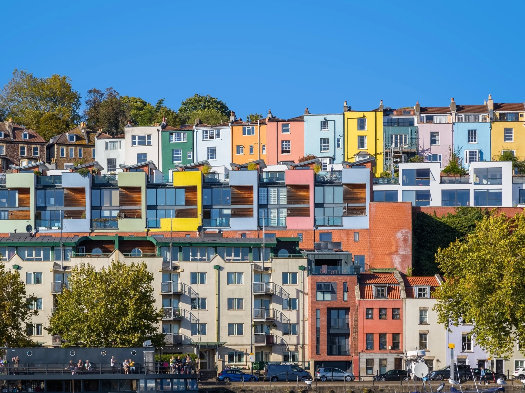 Bristol cityscape, rows of colourful terraced houses in Cliftonwood, Bristol, England , overlooking Bristol Harbourside