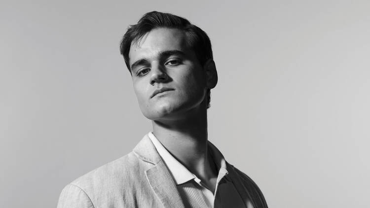 A black and white portrait of actor Will McDonald.