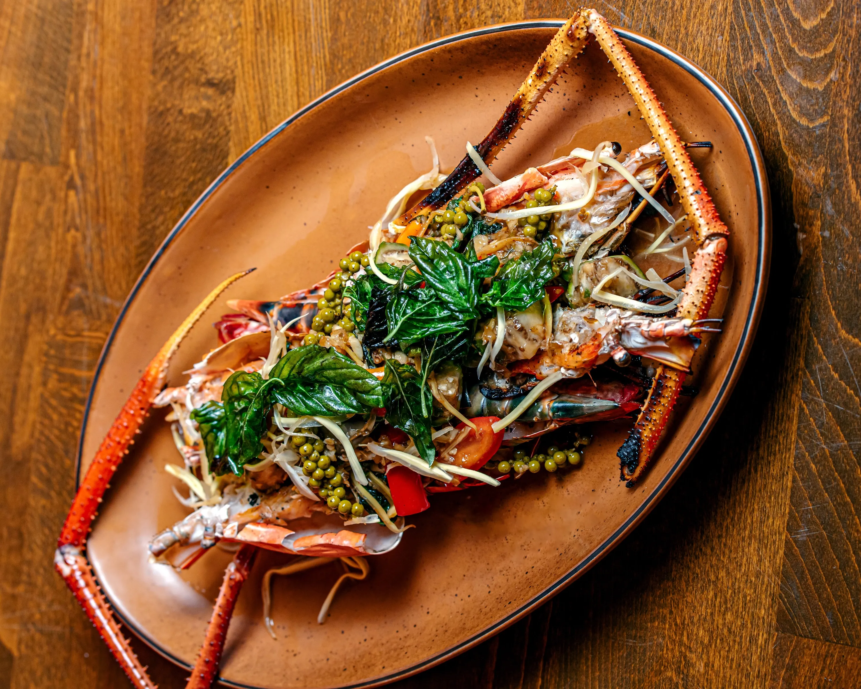 Grilled River Prawn Pad Cha on a red plate