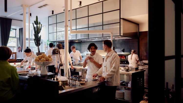 Chefs working in Cutler's kitchen.