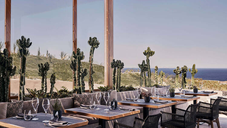 Dinner set up overlooking the surroundings at Magma Resort Santorini
