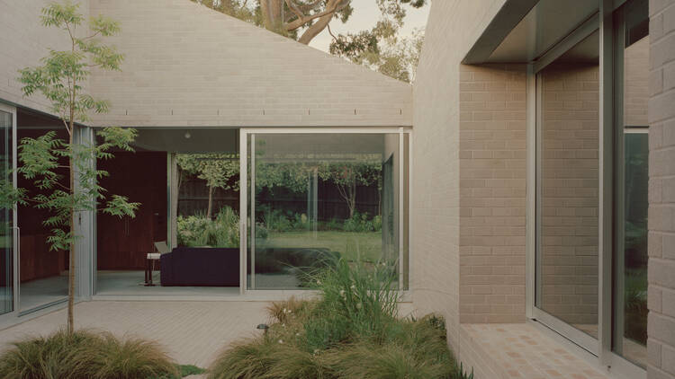 The courtyard of the Naples Street House.