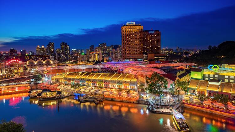 Singapore, Singapore - September 18, 2016 : Colorful light building at night in Clarke Quay, Singapore. It is a historical riverside quay in Singapore, located within the Singapore River Area.