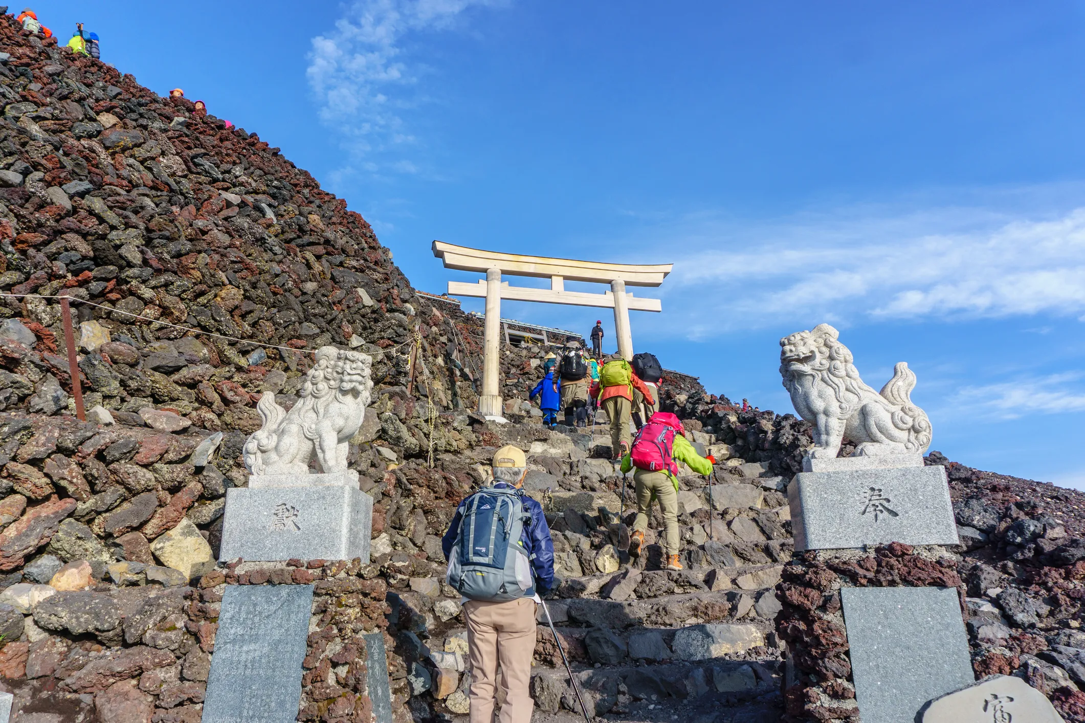 Hikers climbing Mt Fuji