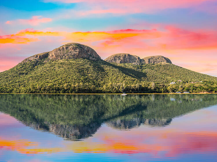 magaliesberg mountains view from hartbeespoort dam during a twilight sky in south africa