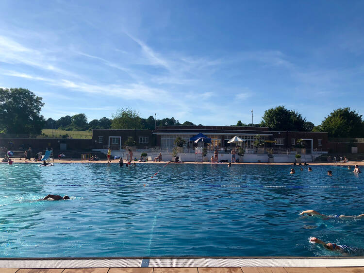 The pool at Parliament Hill Lido on a bright summer day