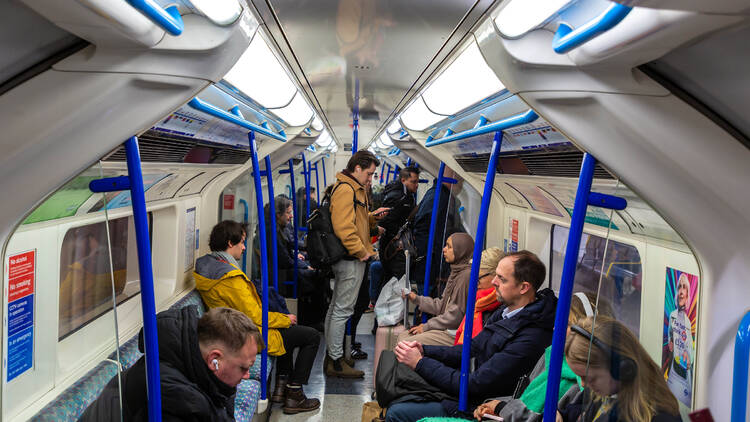 People on tube carriage