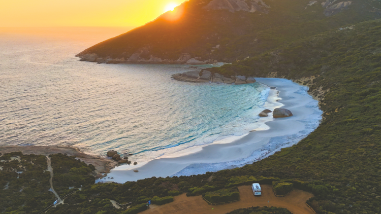Aerial shot of beach at sunset