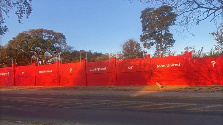 Red wall in Bryanston at the Corner of Grosvenor Road and Bryanston Drive