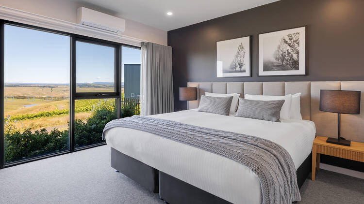 The bedroom at a cabin in Marnong Estate.