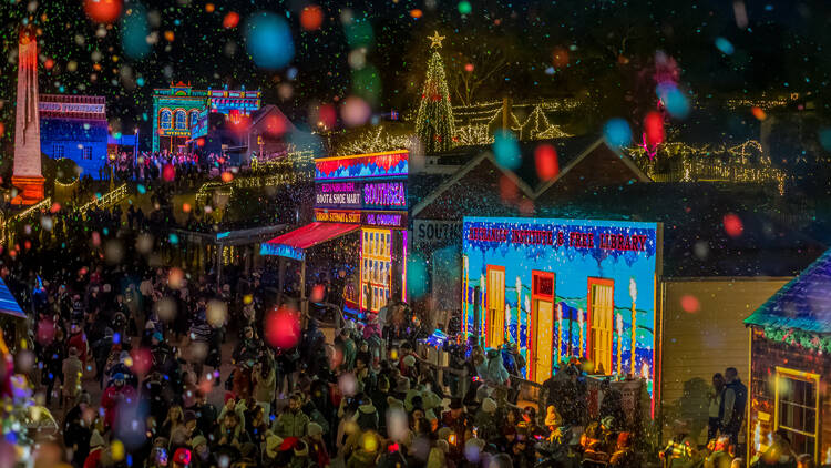 Snow falling at night at Winter Wonderlights at Sovereign Hill.