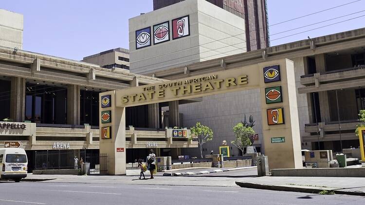 The State Theatre in Pretoria, showing the entrance to the car park, going underground. The Theatre plays a leading role in the development of the performing arts, and is host to the variety of entertainment found in different cultures of South Africa.