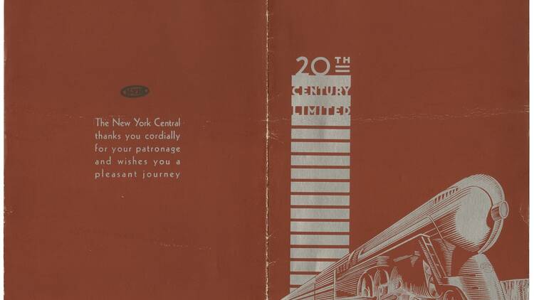 A brown menu with a train on the front.