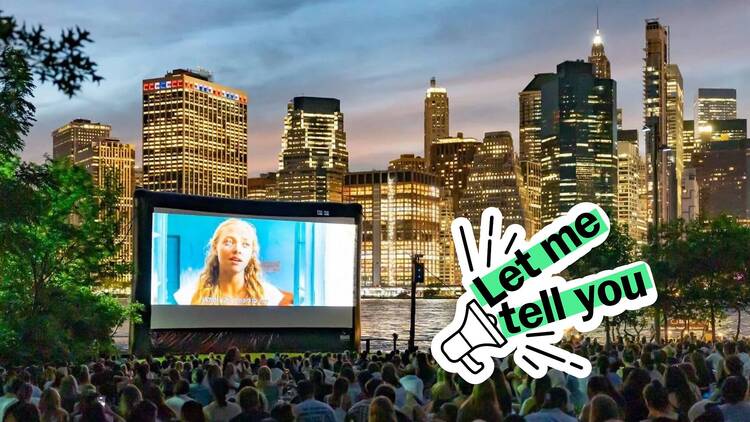 People gather around a movie screen with the NYC skyline in the background.