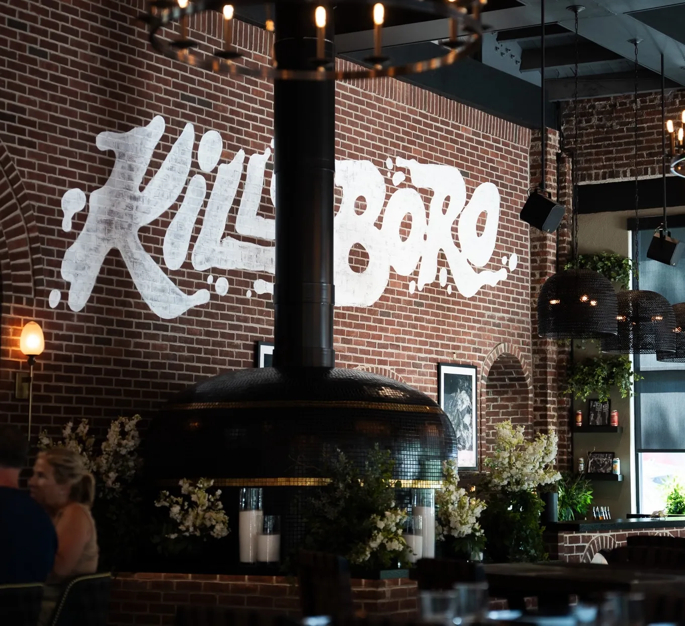 A brick wall that says "Kills Boro"