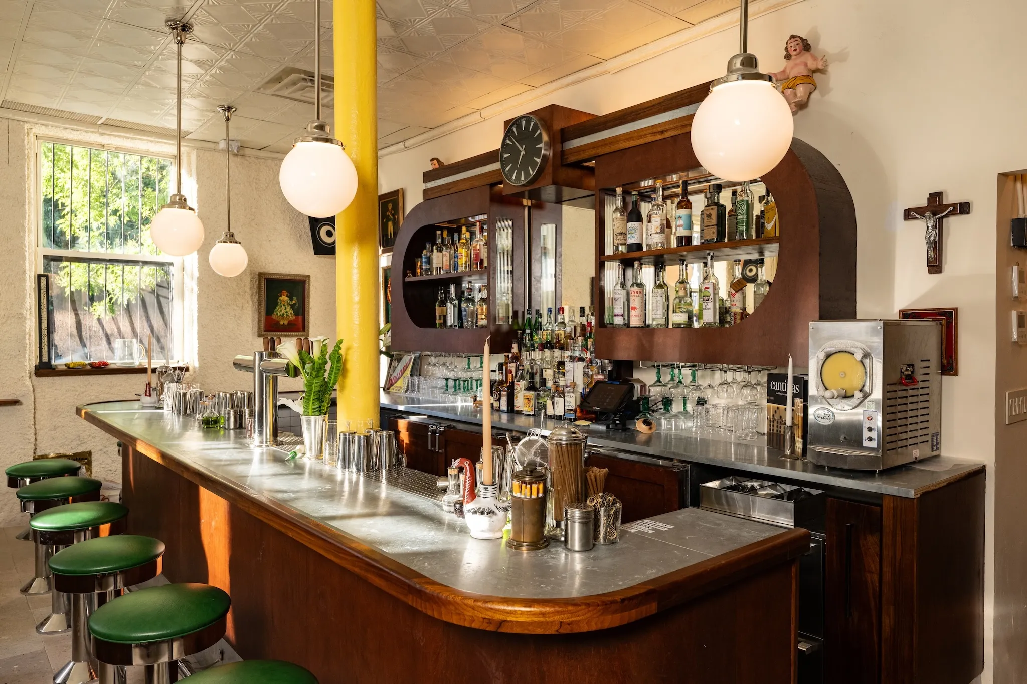 A curved bar with globes