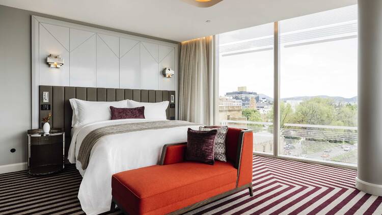Hotel room with red decor