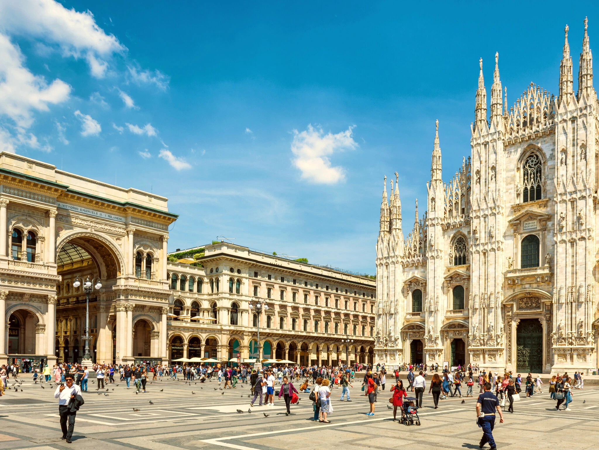 Panorama of Piazza del Duomo, main square of Milan, Italy. Famous Milan Cathedral in center of Milano city. It is top tourist attraction of Milan, World landmark.