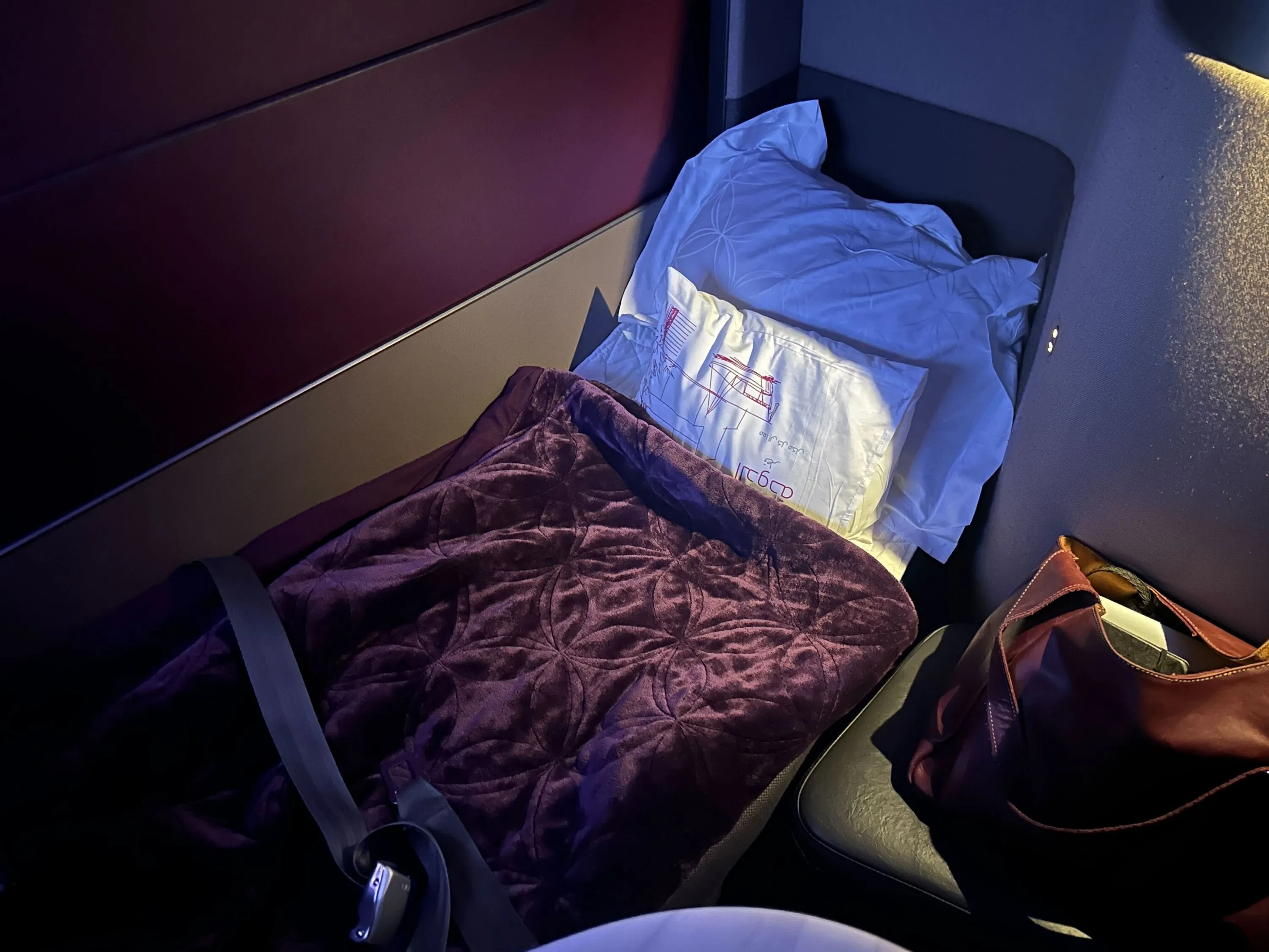 The full flat-lie bed in Qatar Airways' Qsuite.