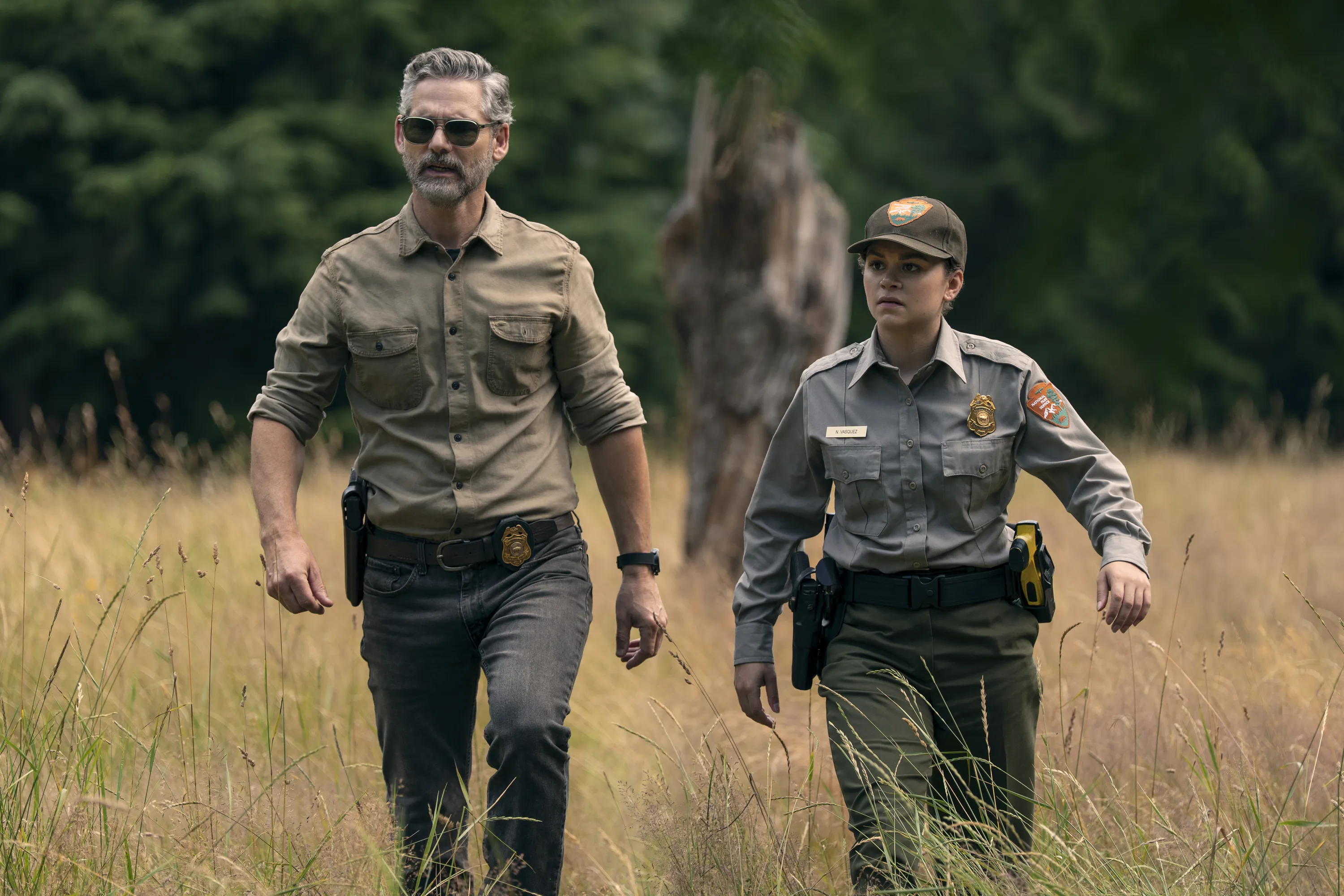 | (L to R) Eric Bana as Kyle Turner, Lily Santiago as Naya Vasquez in Untamed.