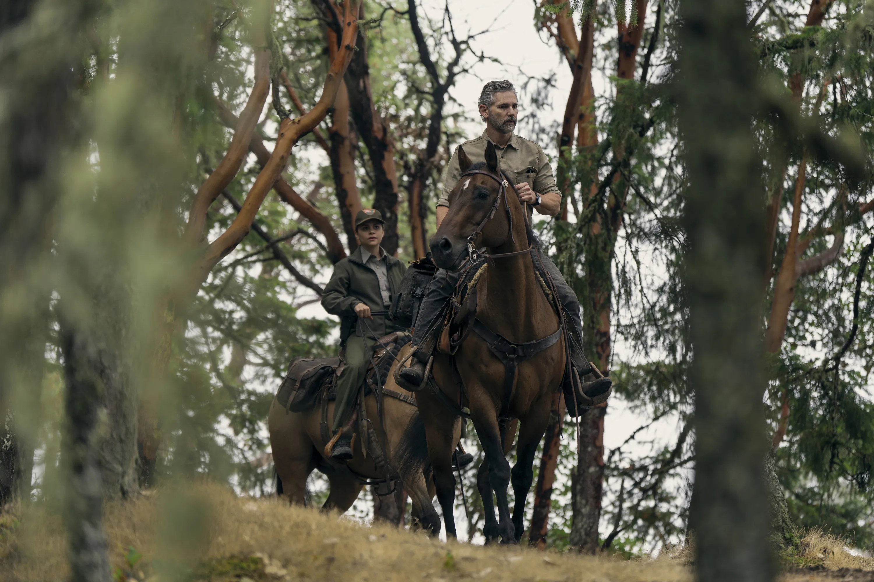 (L to R) Lily Santiago as Naya Vasquez, Eric Bana as Kyle Turner in Untamed.