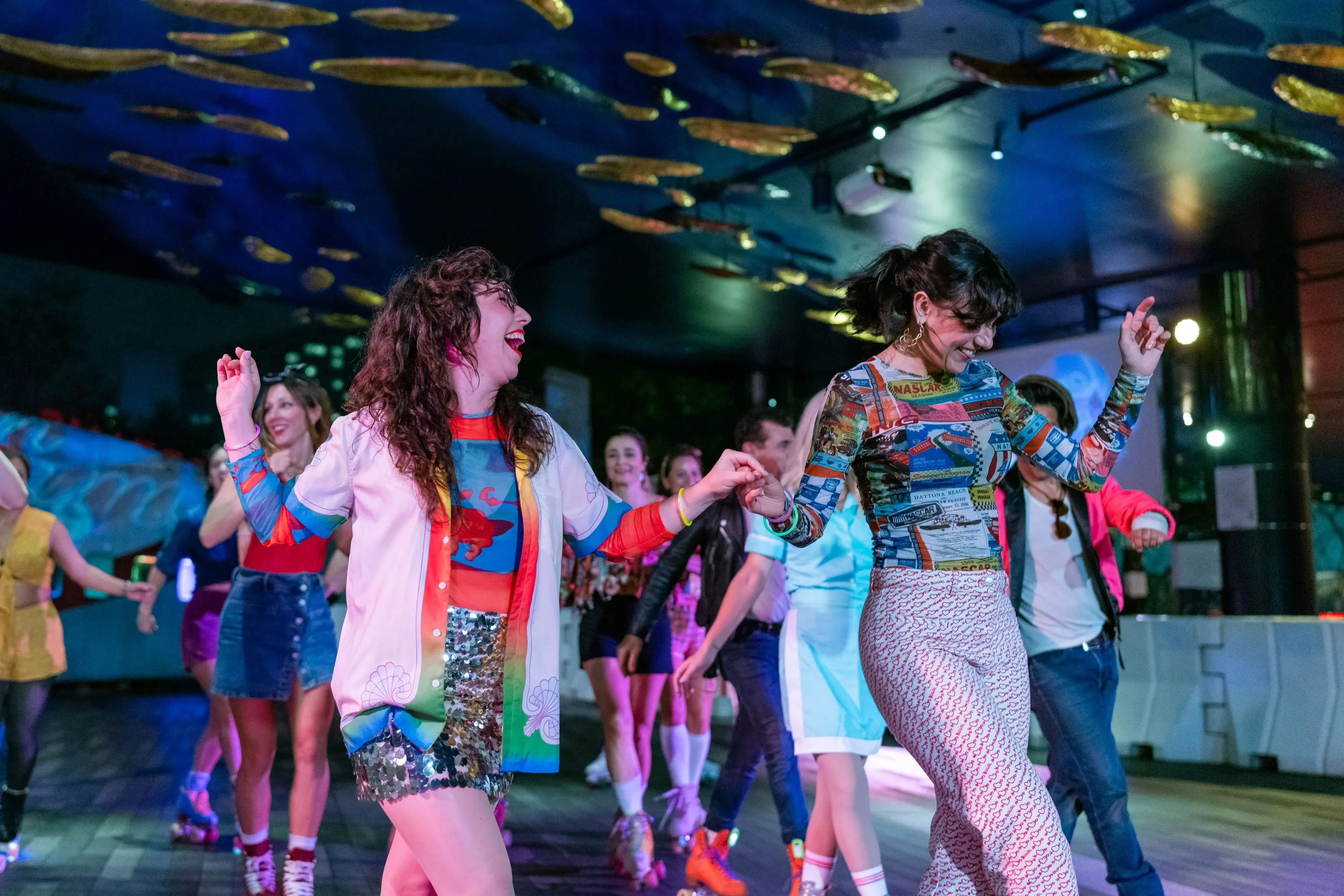 Two women at roller disco