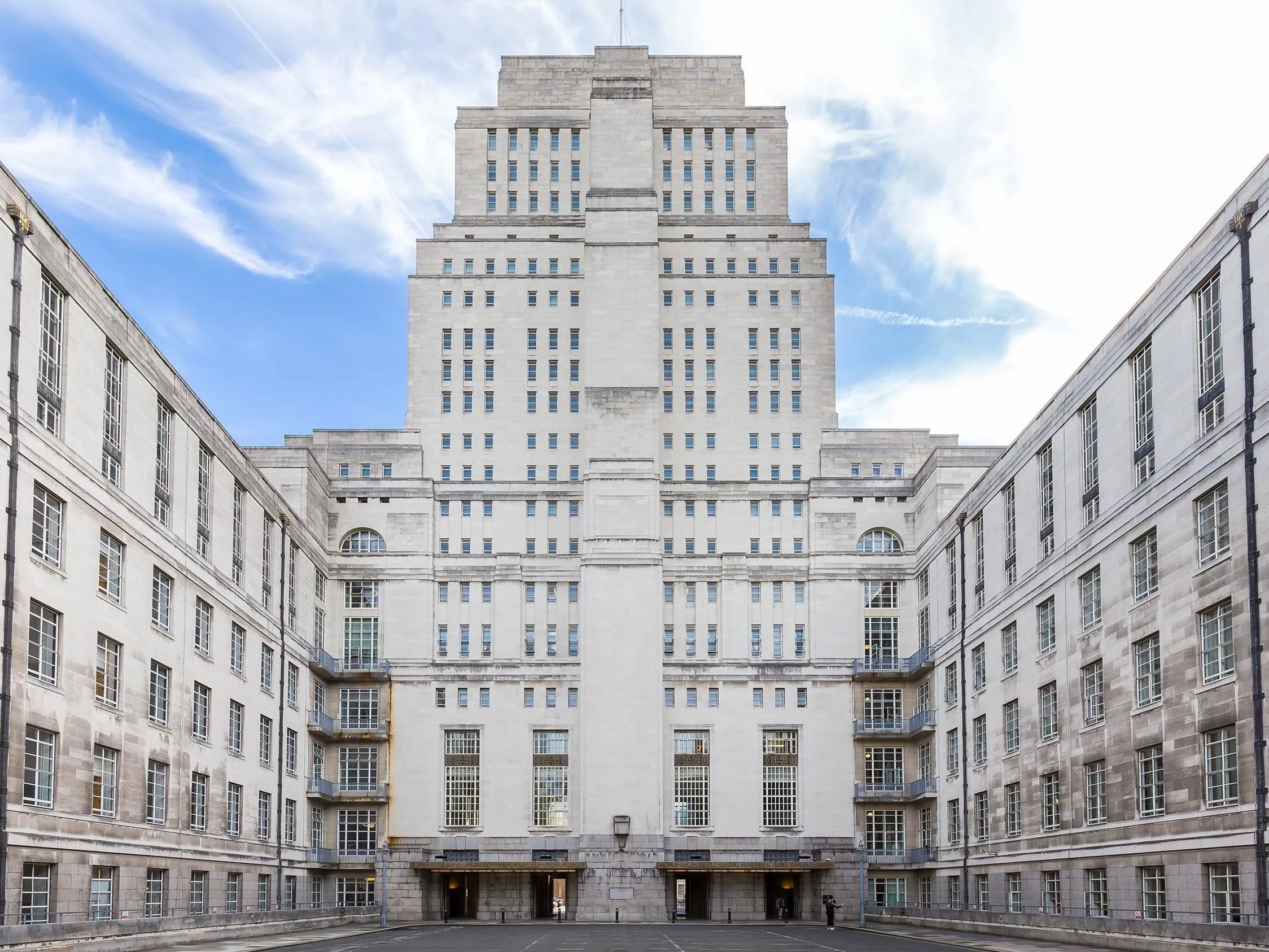 Exterior of Senate House, a tall white, Art Deco style building