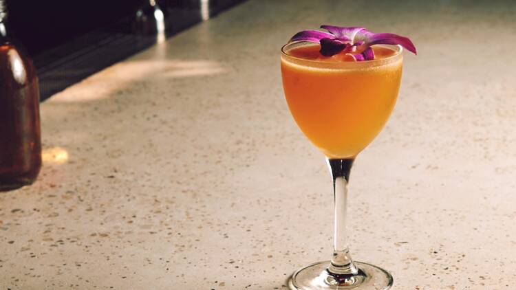 A cocktail on a counter