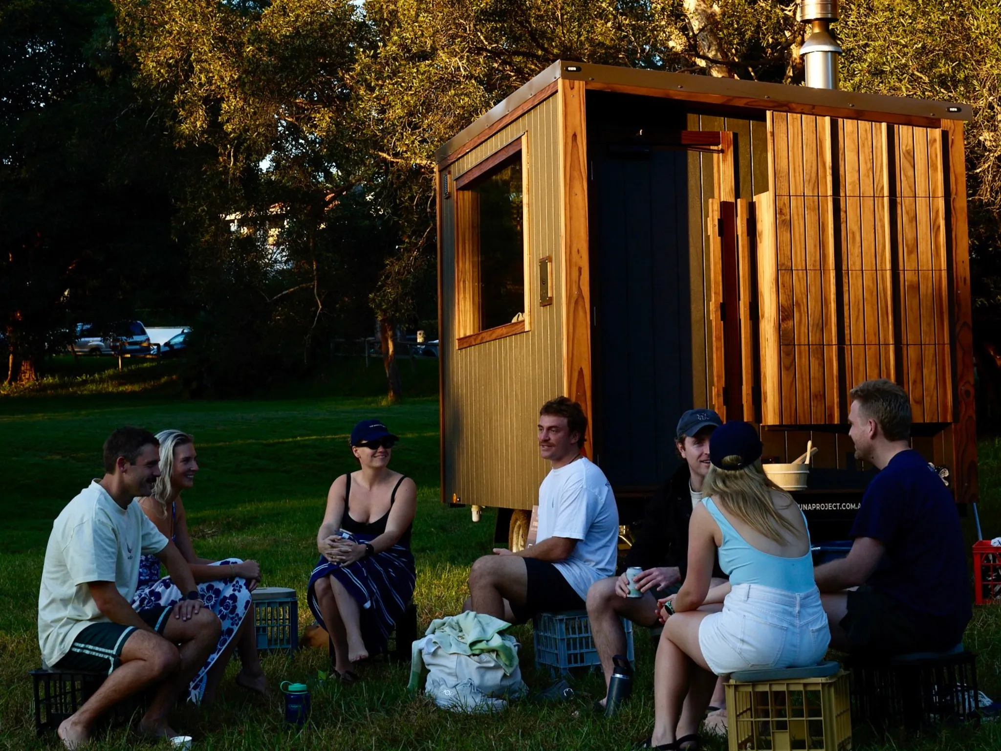 People sitting outside sauna