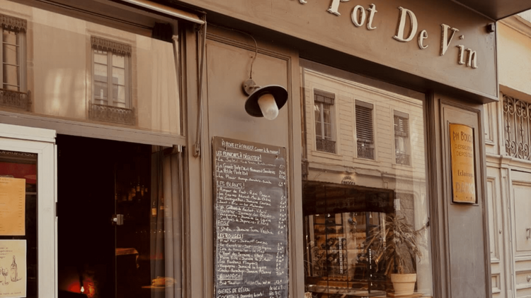 Grab snacks at Au Pot de Vin
