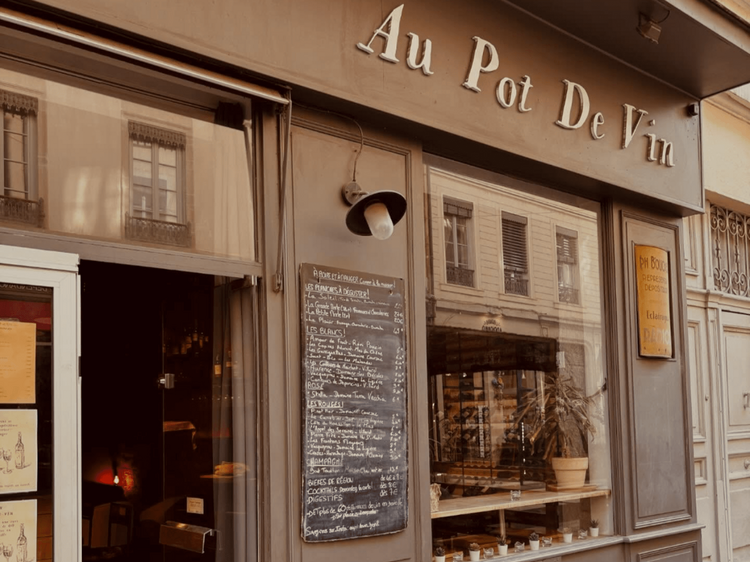 Grab snacks at Au Pot de Vin