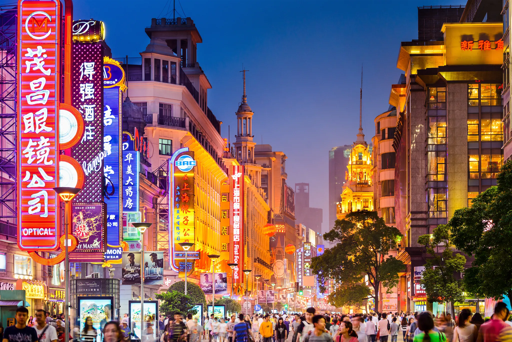 Neon signs lit on Nanjing Road, Shanghai