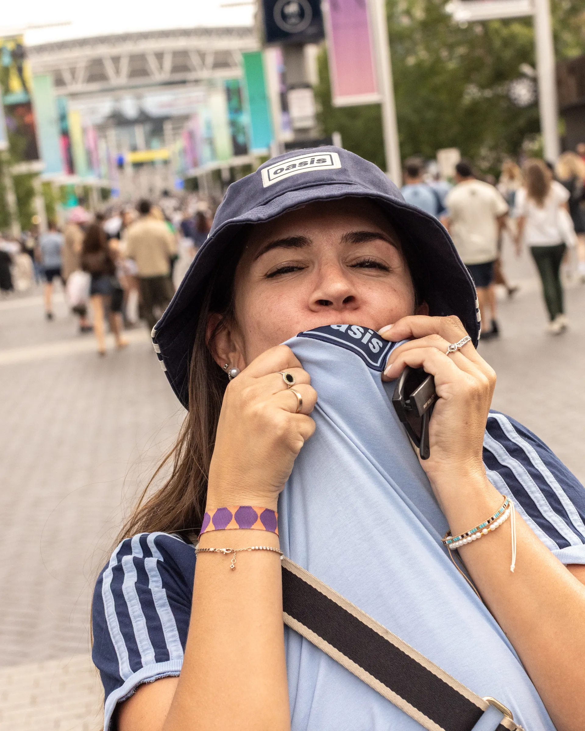 Oasis fans at Wembley Stadium in London for the reunion shows, by Chris Bethell
