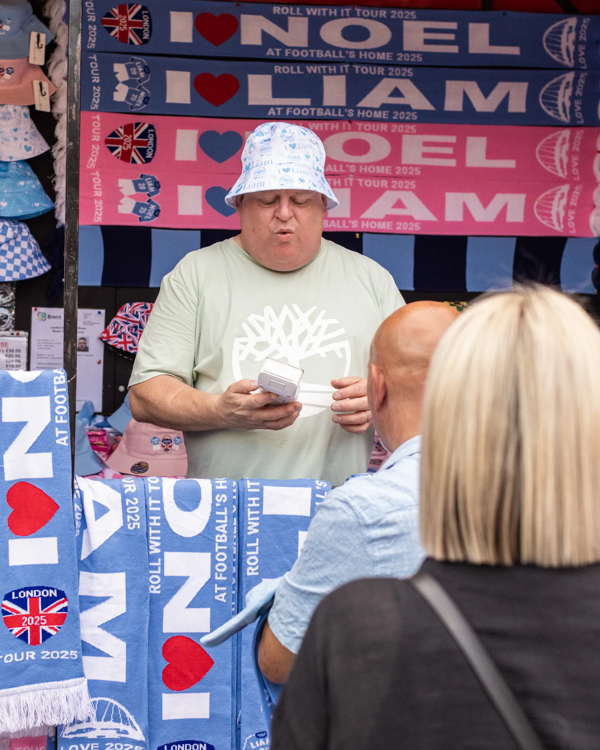 Oasis fans at Wembley Stadium in London for the reunion shows, by Chris Bethell