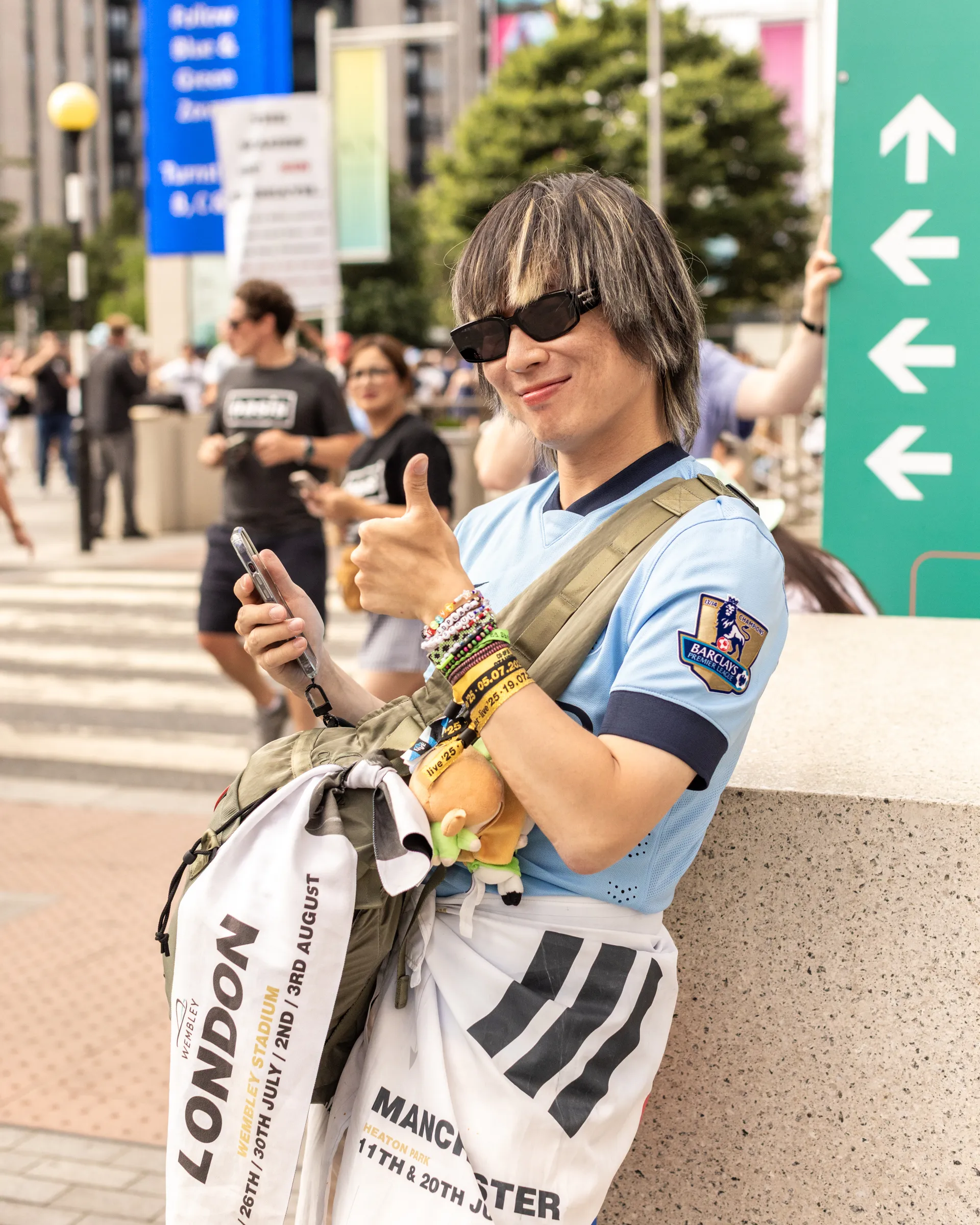 Oasis fans at Wembley Stadium in London for the reunion shows, by Chris Bethell